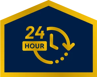 Yellow and blue sign with a clock and arrow symbol, displaying "24 HOUR" to indicate round-the-clock or 24-hour service.